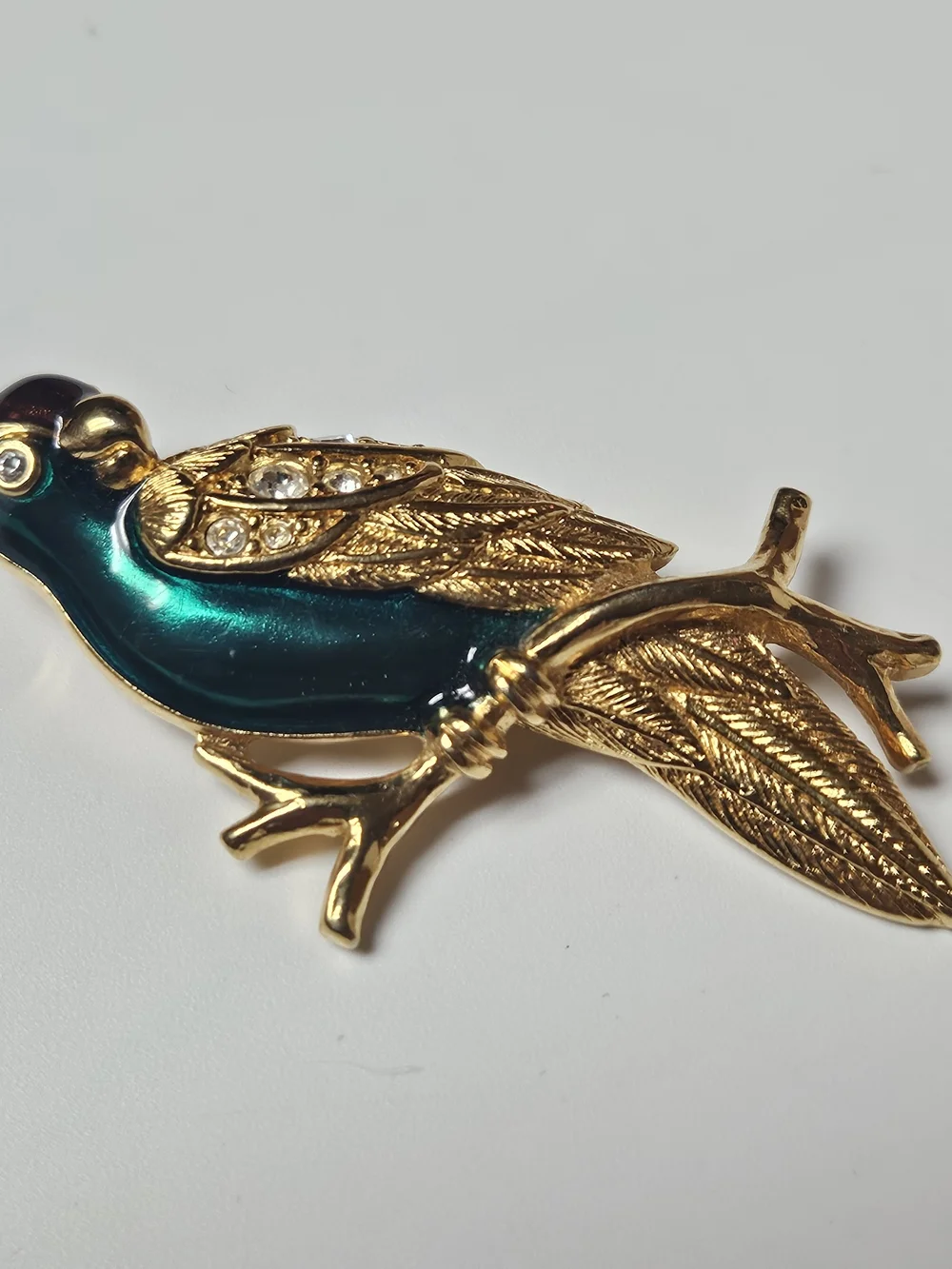 Avon Gold-Tone Parrot Brooch with Iridescent Teal Enamel and Crystals